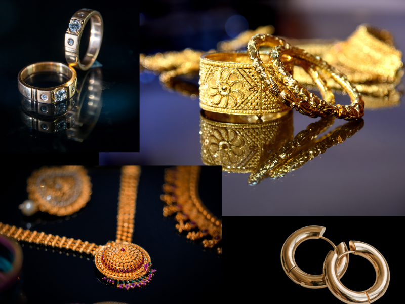 Collection of assorted gold-plated fashion jewellery including rings, bangles, and a pendant, displayed with reflection on a dark surface, for the purpose of demonstrating popular styles